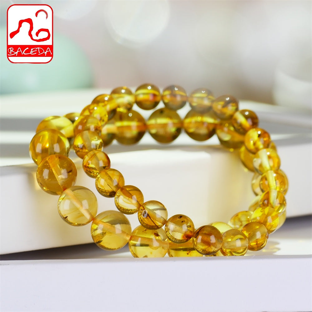 Vòng tay hổ phách tự nhiên Baceda có hạt đính bên trong, đá quý hiếm HQ kèm giấy chứng nhận và nơ quà tặng